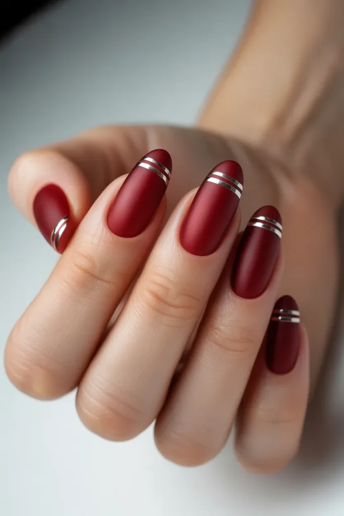 Matte Red and Silver Accent Almond Nails