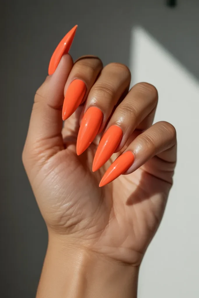 Neon Orange Stiletto Nails