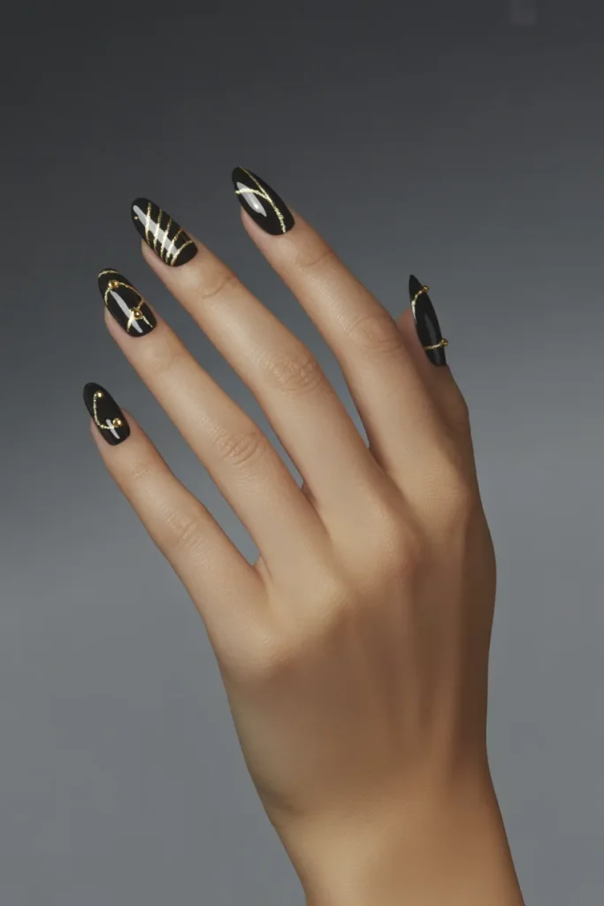 Black and Gold Vampire Nails