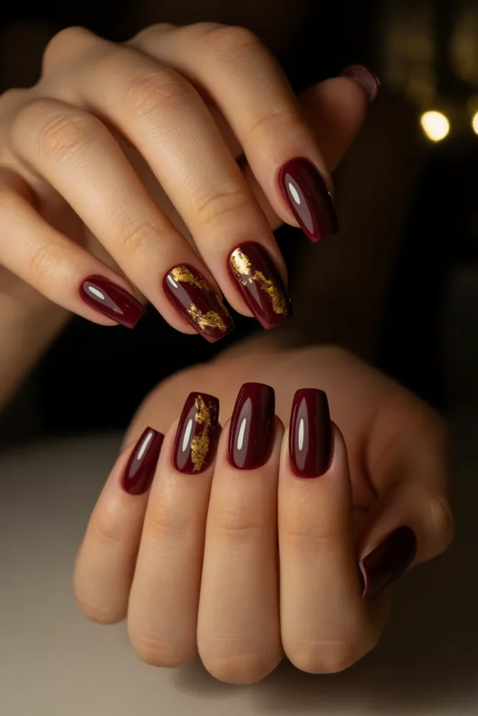 Burgundy and Gold Leaf Nails